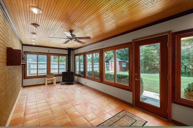 603 Shabbona Trl, Batavia, IL 60510 - unfurnished sunroom featuring a wood stove