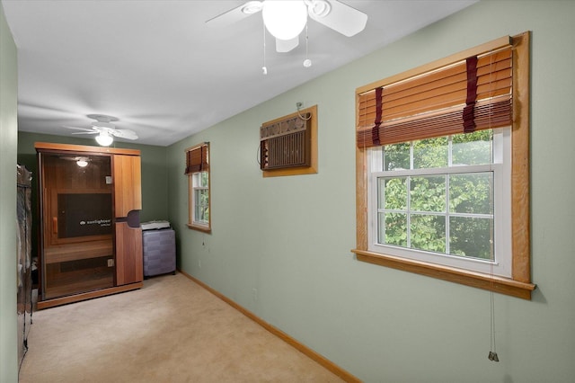 603 Shabbona Trl, Batavia, IL 60510 - spare room featuring a ceiling fan, light colored carpet, and a wall mounted air conditioner