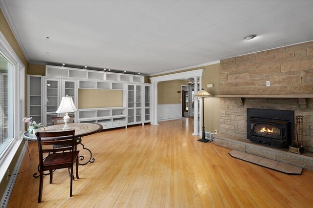 603 Shabbona Trl, Batavia, IL 60510 - living room featuring crown molding, wood finished floors, wainscoting, and baseboard heating