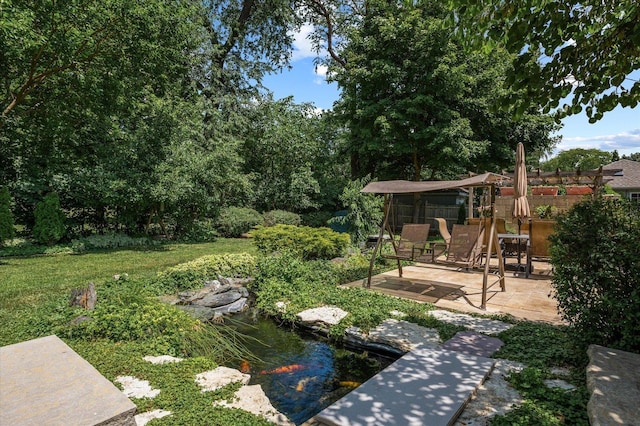 603 Shabbona Trl, Batavia, IL 60510 - view of yard featuring a patio area and a small pond