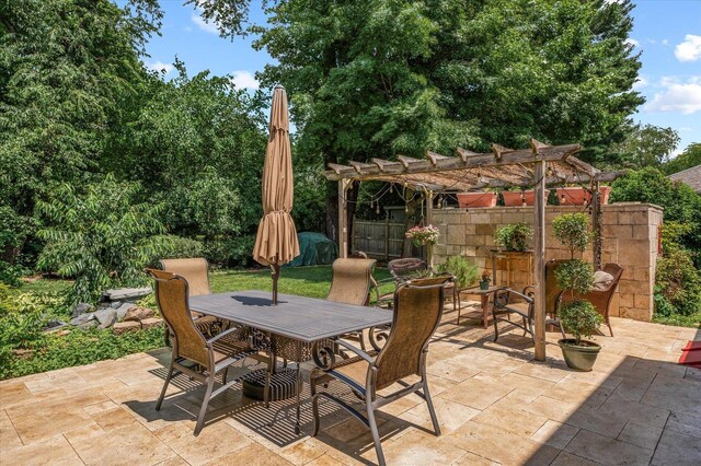 603 Shabbona Trl, Batavia, IL 60510 - view of patio with outdoor dining area and a pergola