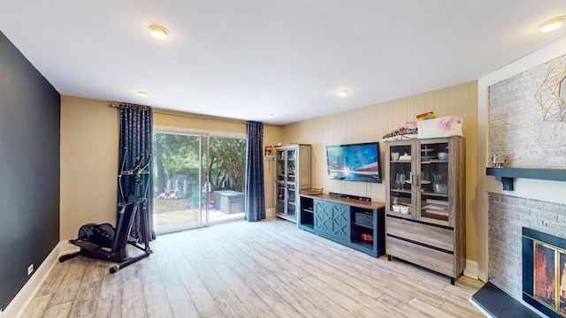 508 Falmore Ln, Bolingbrook, IL 60440 - living area with wood finished floors and a brick fireplace