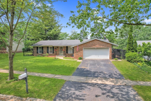 508 Falmore Ln, Bolingbrook, IL 60440 - ranch-style home with asphalt driveway, brick siding, a garage, and a chimney