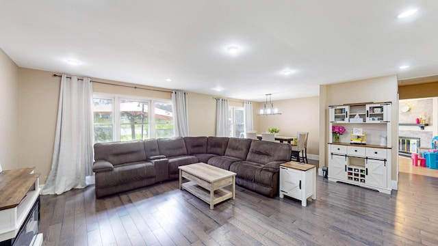 508 Falmore Ln, Bolingbrook, IL 60440 - living room featuring a chandelier, dark wood-type flooring, and recessed lighting