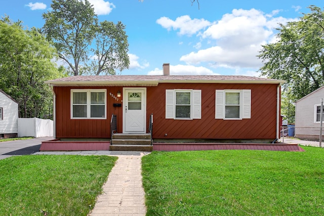 22227 Clyde Ave, Sauk Village, IL 60411 - view of front of home with a chimney