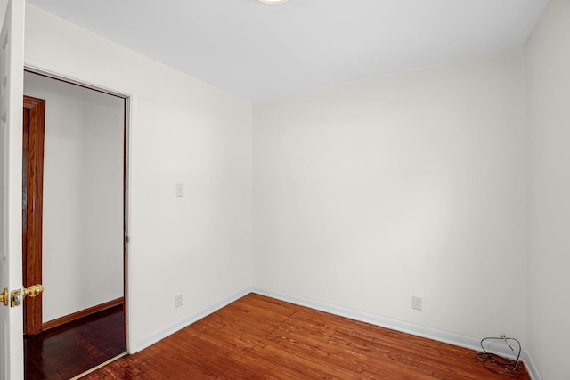 22227 Clyde Ave, Sauk Village, IL 60411 - unfurnished room featuring wood finished floors and baseboards