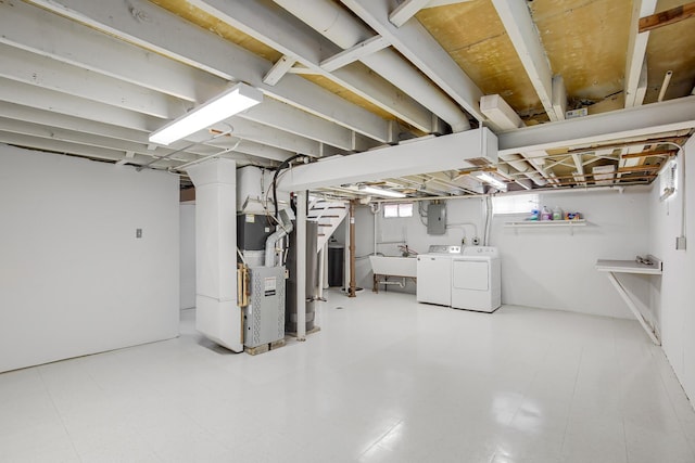 22227 Clyde Ave, Sauk Village, IL 60411 - below grade area featuring washer and clothes dryer, electric panel, and heating unit