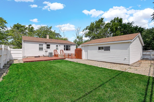 22227 Clyde Ave, Sauk Village, IL 60411 - rear view of property with a fenced backyard, a deck, an outdoor structure, and a chimney