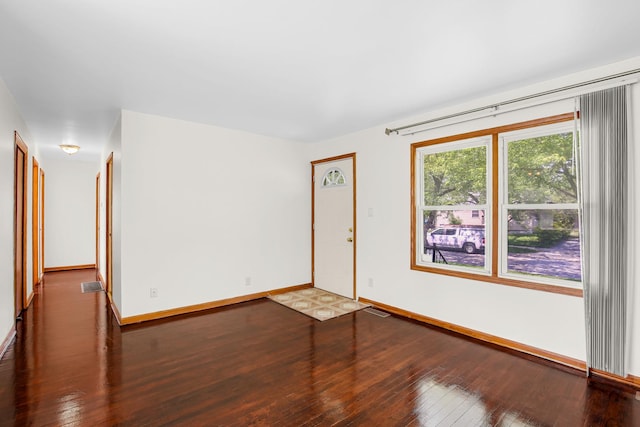 22227 Clyde Ave, Sauk Village, IL 60411 - spare room with hardwood / wood-style flooring and baseboards