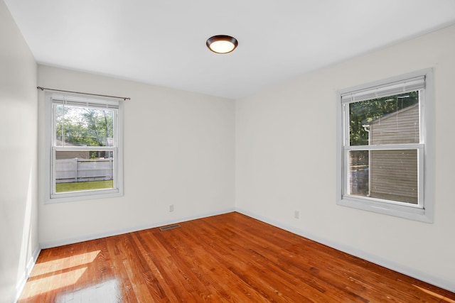 22227 Clyde Ave, Sauk Village, IL 60411 - spare room with wood finished floors