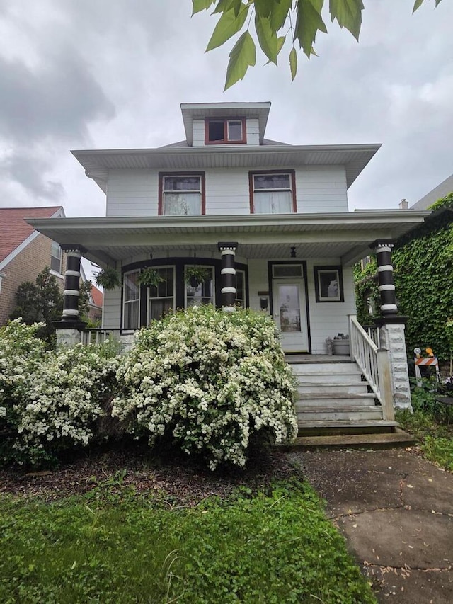 5071 W Pensacola Ave, Chicago, IL 60641 - american foursquare style home with a porch