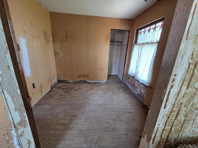 5071 W Pensacola Ave, Chicago, IL 60641 - bedroom with hardwood / wood-style floors, multiple windows, and a ceiling fan