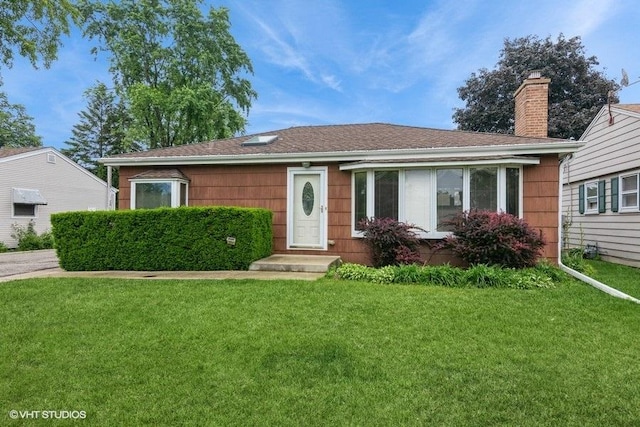 945 S Wolf Rd, Des Plaines, IL 60016 - single story home with a front lawn and a chimney
