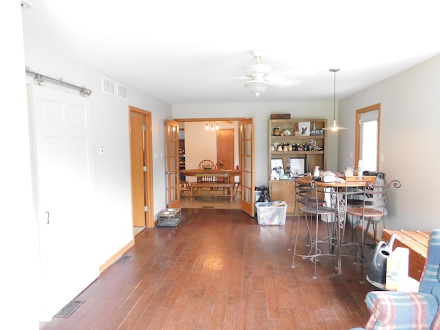 1064 N 129th Infantry Dr, Joliet, IL 60435 - dining room with wood-type flooring and a ceiling fan