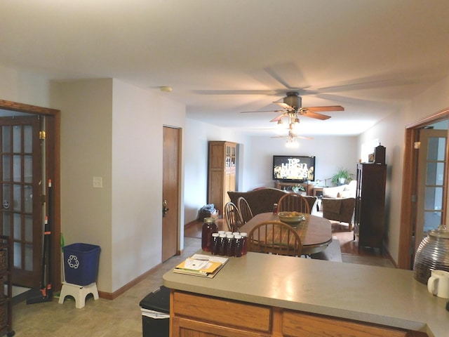1064 N 129th Infantry Dr, Joliet, IL 60435 - kitchen featuring a ceiling fan and light countertops