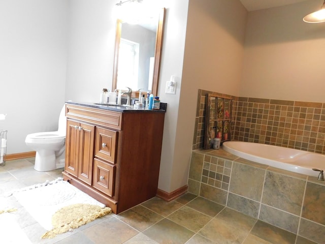 1064 N 129th Infantry Dr, Joliet, IL 60435 - full bath with a garden tub, vanity, toilet, baseboards, and tile patterned flooring
