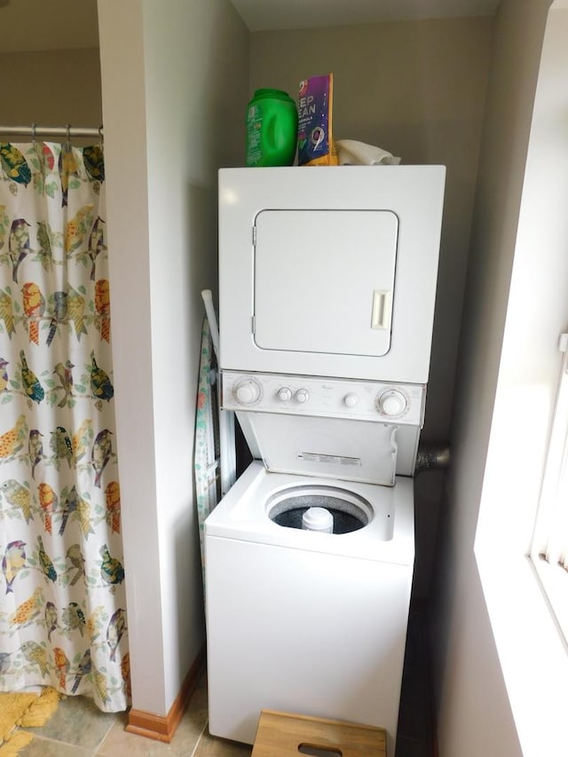 1064 N 129th Infantry Dr, Joliet, IL 60435 - laundry room with stacked washer / dryer