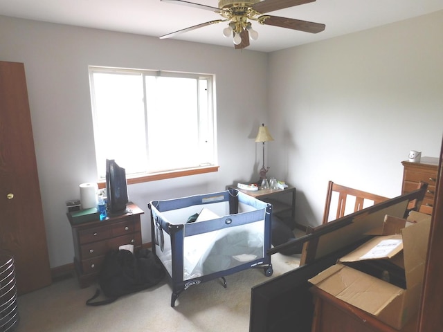 1064 N 129th Infantry Dr, Joliet, IL 60435 - carpeted bedroom with a ceiling fan and baseboards