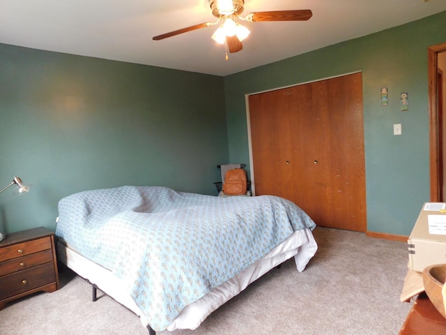 1064 N 129th Infantry Dr, Joliet, IL 60435 - bedroom featuring a closet, light carpet, and a ceiling fan