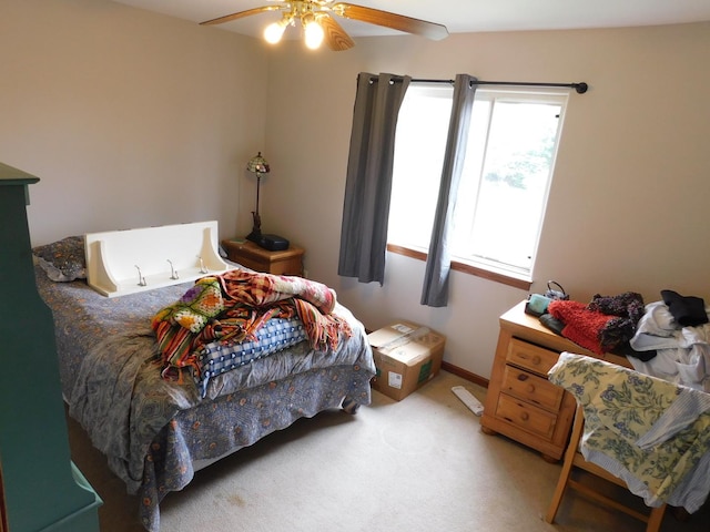1064 N 129th Infantry Dr, Joliet, IL 60435 - bedroom featuring ceiling fan and light colored carpet