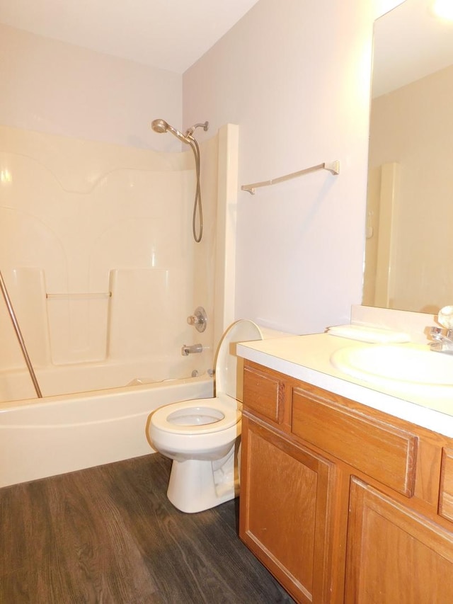 1064 N 129th Infantry Dr, Joliet, IL 60435 - bathroom with vanity,  shower combination, toilet, and wood finished floors