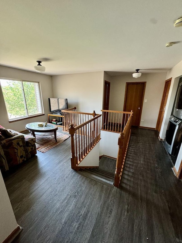 1064 N 129th Infantry Dr, Joliet, IL 60435 - living room featuring wood finished floors and baseboards