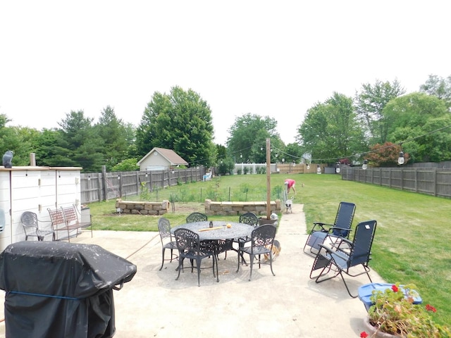 1064 N 129th Infantry Dr, Joliet, IL 60435 - view of patio / terrace with outdoor dining area and a grill