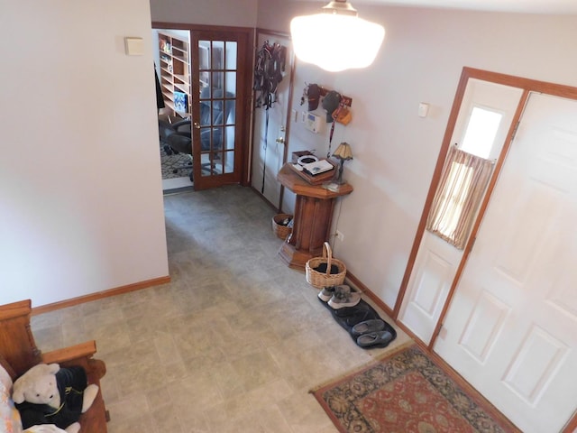 1064 N 129th Infantry Dr, Joliet, IL 60435 - foyer entrance with baseboards, french doors, and tile patterned floors