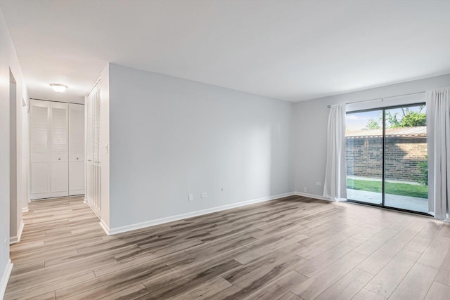 3515 Central Rd Unit 103, Glenview, IL 60025 - empty room featuring light wood-type flooring and baseboards