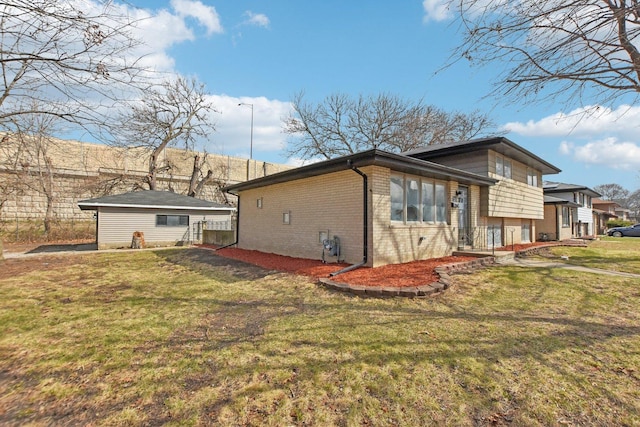 1848 172nd St, East Hazel Crest, IL 60429 - view of home's exterior featuring brick siding and a lawn