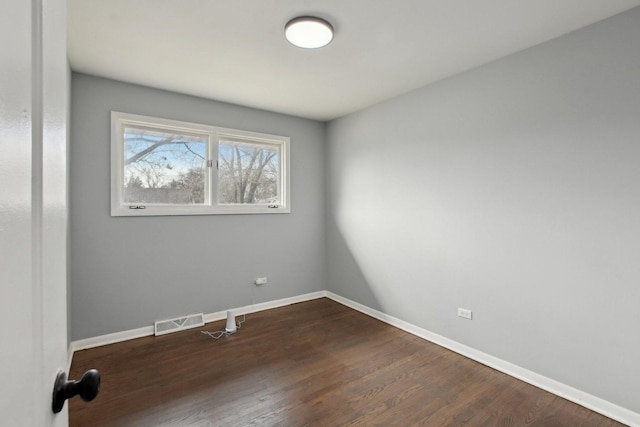 1848 172nd St, East Hazel Crest, IL 60429 - empty room featuring baseboards and dark wood-type flooring