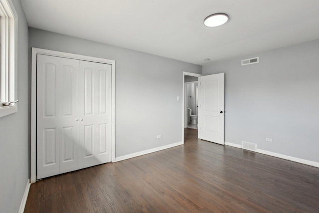 1848 172nd St, East Hazel Crest, IL 60429 - unfurnished bedroom with wood finished floors, baseboards, and a closet