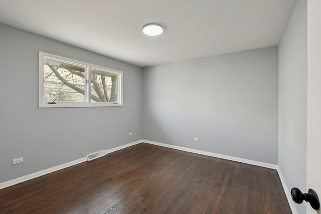 1848 172nd St, East Hazel Crest, IL 60429 - empty room featuring dark wood finished floors and baseboards