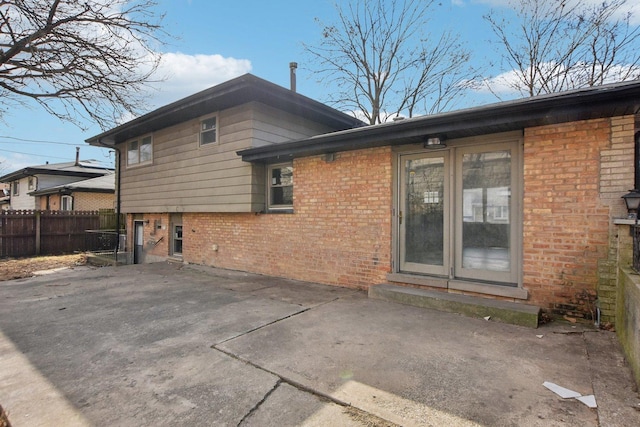 1848 172nd St, East Hazel Crest, IL 60429 - rear view of house with a patio area and brick siding