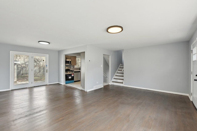 1848 172nd St, East Hazel Crest, IL 60429 - unfurnished living room with stairs, baseboards, and dark wood finished floors
