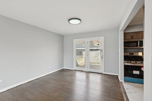 1848 172nd St, East Hazel Crest, IL 60429 - unfurnished dining area with baseboards and dark wood-style floors