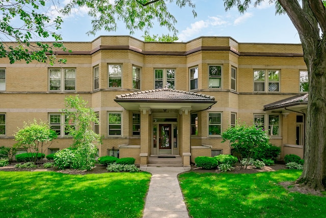 206 S Lombard Ave Unit 206B, Oak Park, IL 60302 - view of front of property featuring a front lawn and brick siding