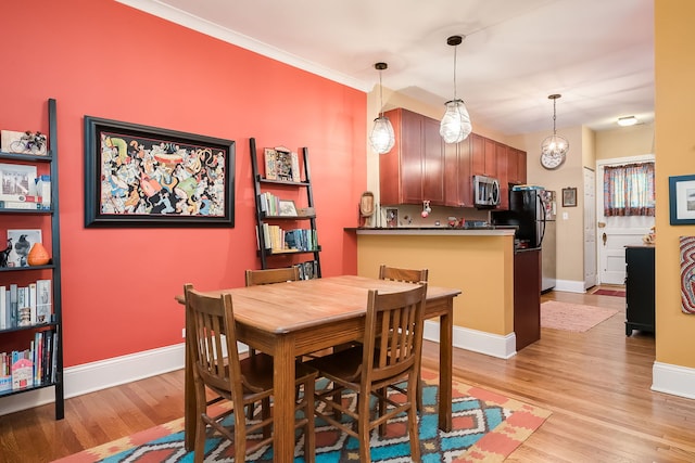 206 S Lombard Ave Unit 206B, Oak Park, IL 60302 - dining room featuring light wood-style floors