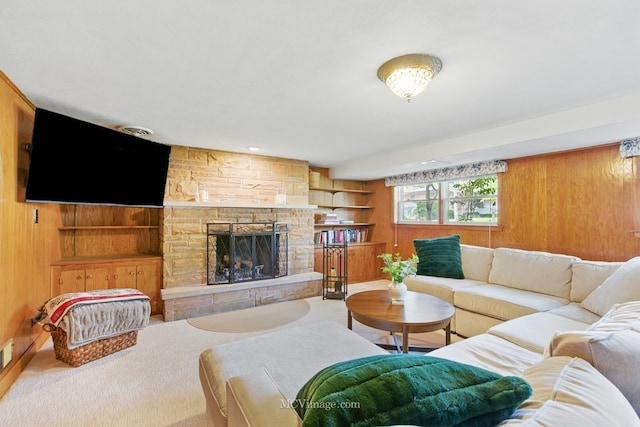 1703 Wilmette St, Wheaton, IL 60187 - living room featuring wooden walls, a fireplace, and built in shelves