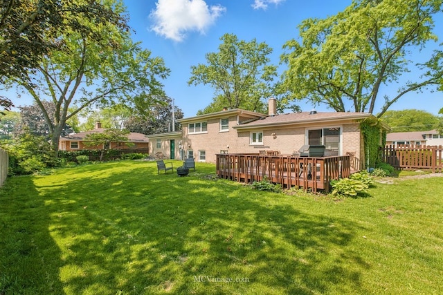 1703 Wilmette St, Wheaton, IL 60187 - rear view of property featuring brick siding, a deck, and a chimney