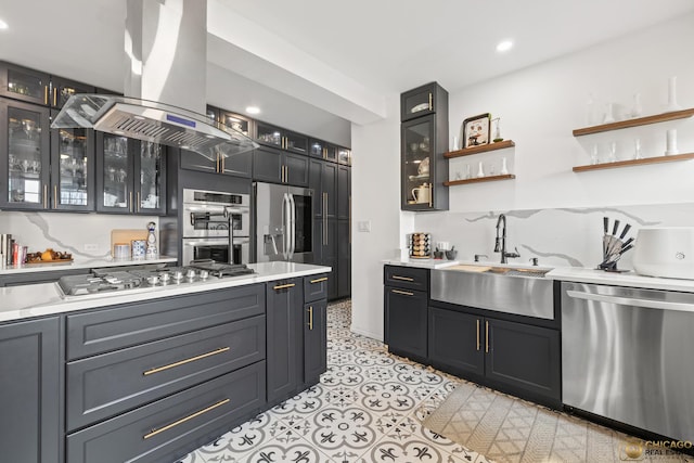 7321 S S Shore Dr Unit 10A, Chicago, IL 60649 - kitchen with appliances with stainless steel finishes, island exhaust hood, light countertops, open shelves, and glass insert cabinets