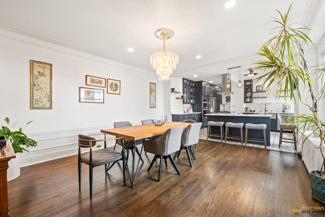 7321 S S Shore Dr Unit 10A, Chicago, IL 60649 - dining area featuring a chandelier, dark wood-type flooring, crown molding, and recessed lighting