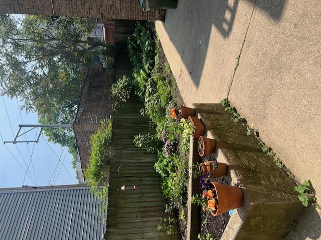 1359 W Elmdale Ave Unit G, Chicago, IL 60660 - view of side of property with stucco siding