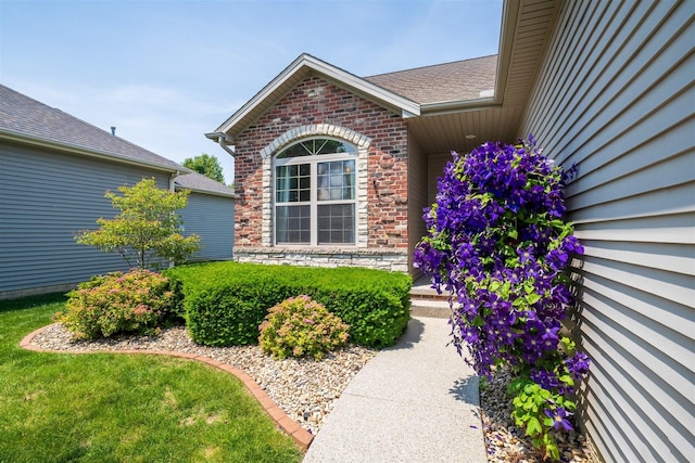 1720 Eide Rd, Bloomington, IL 61704 - property entrance featuring brick siding
