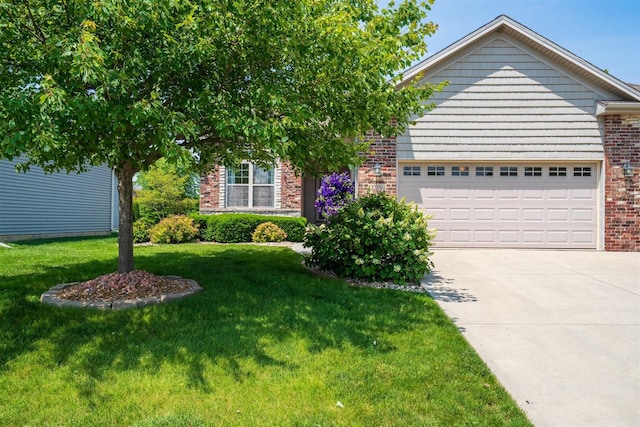 1720 Eide Rd, Bloomington, IL 61704 - view of front of home with brick siding, concrete driveway, a front lawn, and a garage