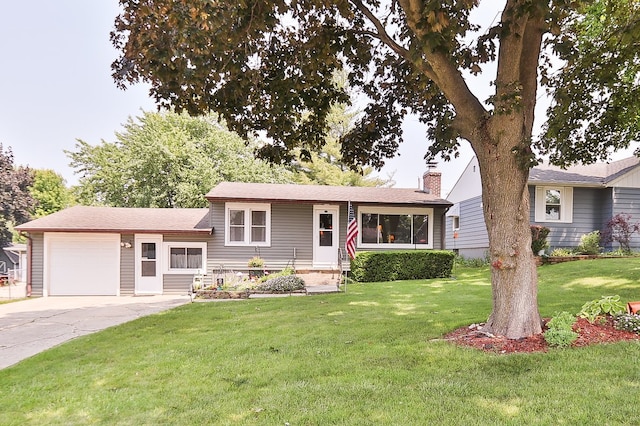 274 Crystal Ave, South Elgin, IL 60177 - split level home with a chimney, an attached garage, a front lawn, and driveway