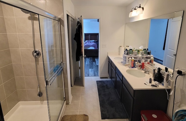 404 Radcliff Ln, South Elgin, IL 60177 - ensuite bathroom with double vanity, a stall shower, and tile patterned flooring