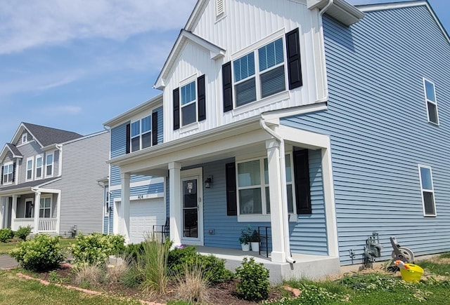404 Radcliff Ln, South Elgin, IL 60177 - view of front facade with a porch and board and batten siding