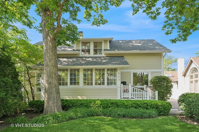 503 Oakdale Ave, Glencoe, IL 60022 - back of property featuring a chimney and roof with shingles
