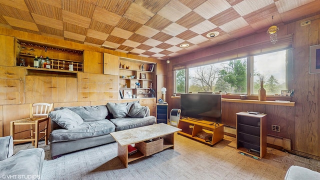 816 Rosedale Ter, Crete, IL 60417 - living area with wooden walls, a baseboard heating unit, and built in features